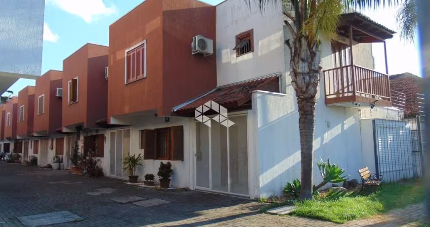 Casa em condomínio para comprar com 3 quartos sendo 1 suíte no bairro Tristeza.