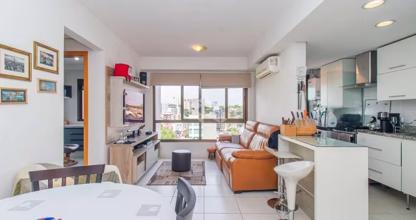 Excelente apartamento de 02 dormitórios com 01 suíte com  65,31m² privativos e 01 vaga coberta e escriturada no Passo da Areia em Porto Alegre,
