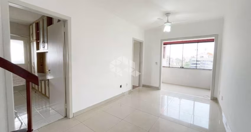 Cobertura de 3 dormitórios, 1 suíte e 2 vagas no bairro Jardim Lindóia em Porto Alegre-RS!