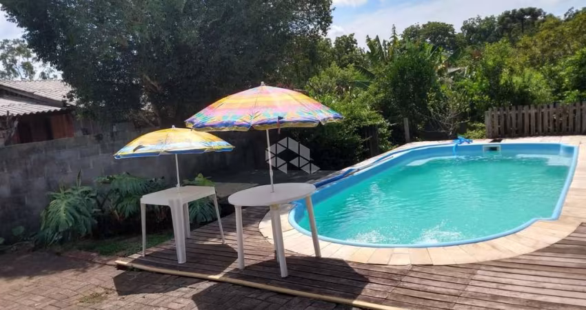 Casa com 2 dormitorios e piscina próximo à GM