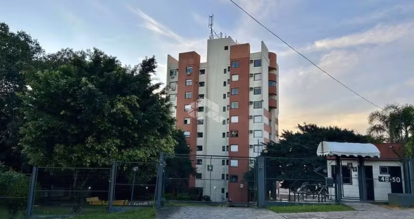 2 dormitórios com box escriturado. Andar alto