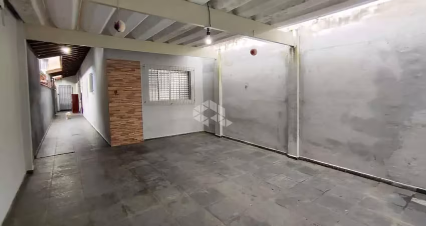 Casa geminada a venda na praia grande, no bairro tupi, com 2 dormitórios, 1 suíte e 2 vagas