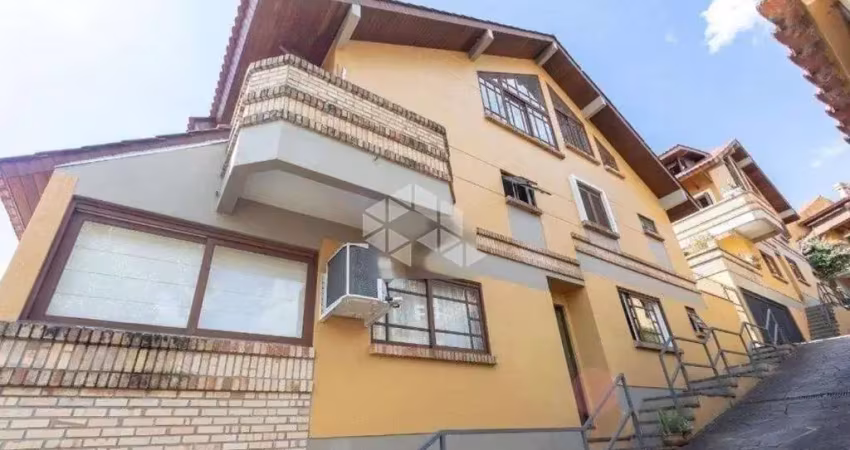 Casa com 3 quartos à venda na Rua Edgar Luiz Schneider, 54, Jardim Isabel, Porto Alegre