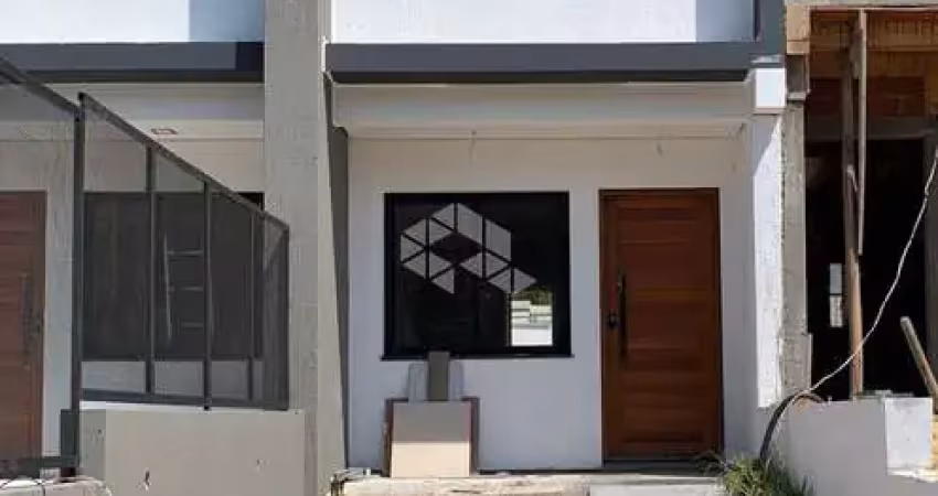 Casa com 2 quartos à venda na Rua Canísio Binsfeld, 282, Hípica, Porto Alegre