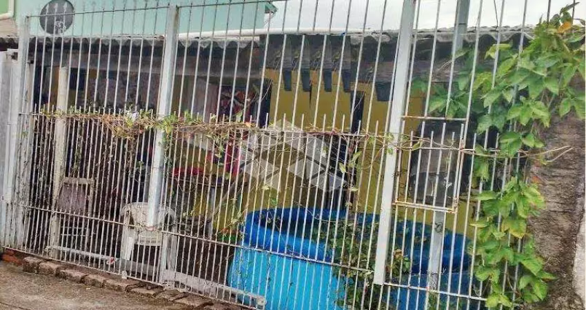 Casa com 4 quartos à venda na Rua Jerolomo Minuzo, 270, Vila Nova, Porto Alegre