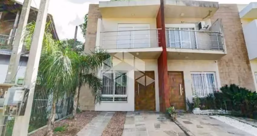 Casa com 3 quartos à venda na Avenida Vereador Roberto Landell de Moura, 326, Campo Novo, Porto Alegre
