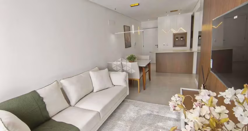 Apartamento mobiliado e decorado, 02 quartos/suítes, no centro de capão da canoa/rs.