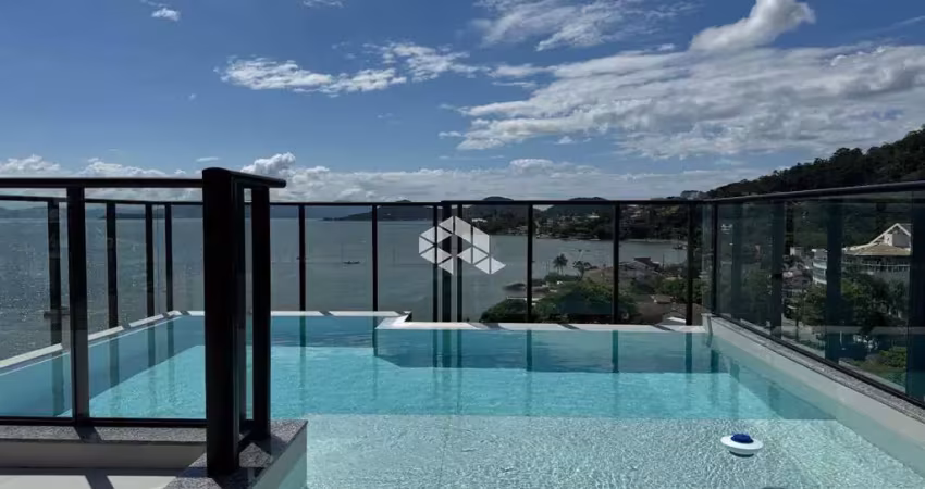 Apartamento com 2 quartos 1 suíte 1 vaga de garagem e vista parcial para o mar em cacupé florianópolis/sc