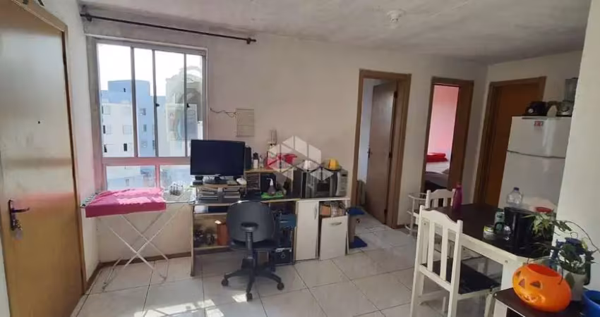 Apartamento com dois quartos, andar alto, próximo a pucrs.