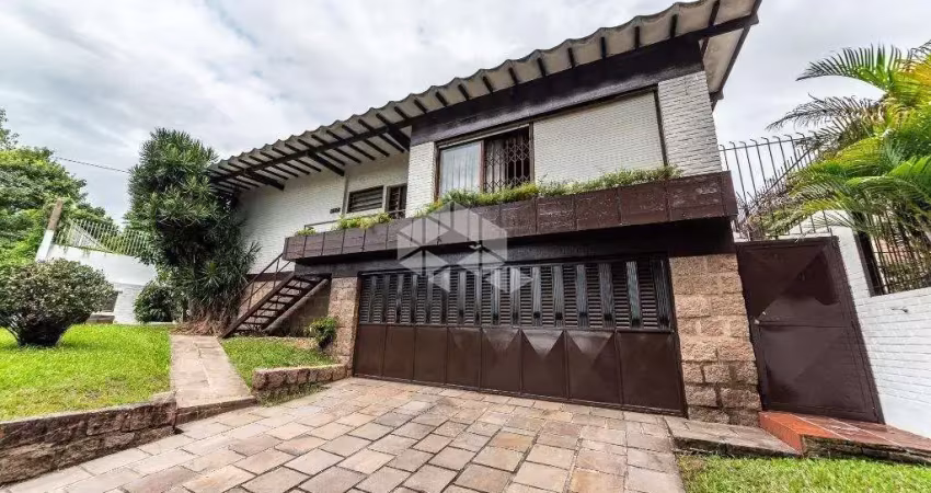 Casa com 3 quartos à venda na Rua João Paetzel, 821, Chácara das Pedras, Porto Alegre