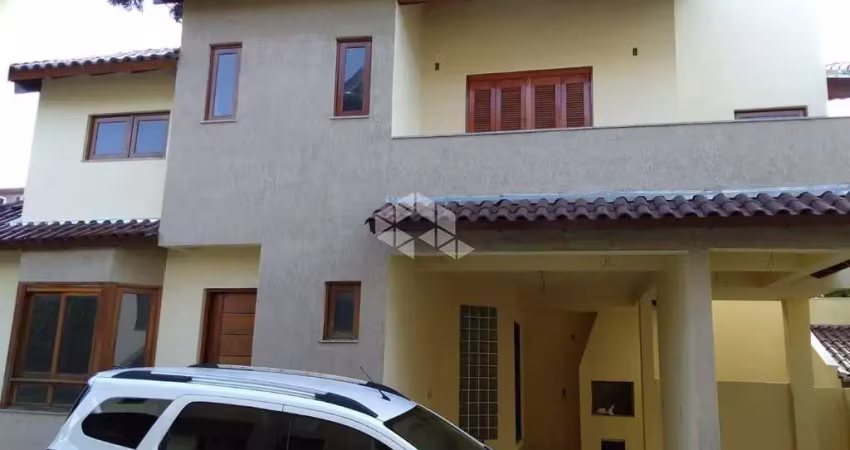 Casa em condomínio fechado, com 3 dormitórios, sendo 1 suite - bairro tristeza