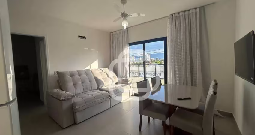 Apartamento com 1 dormitório para alugar, 49 m² por R$ 2.542,96/mês - Indaiá - Caraguatatuba/SP