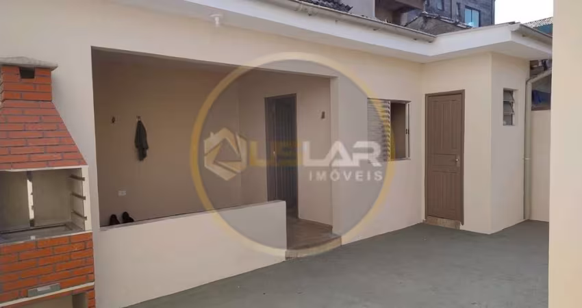 Casa térrea com edícula na ponta da praia em Santos