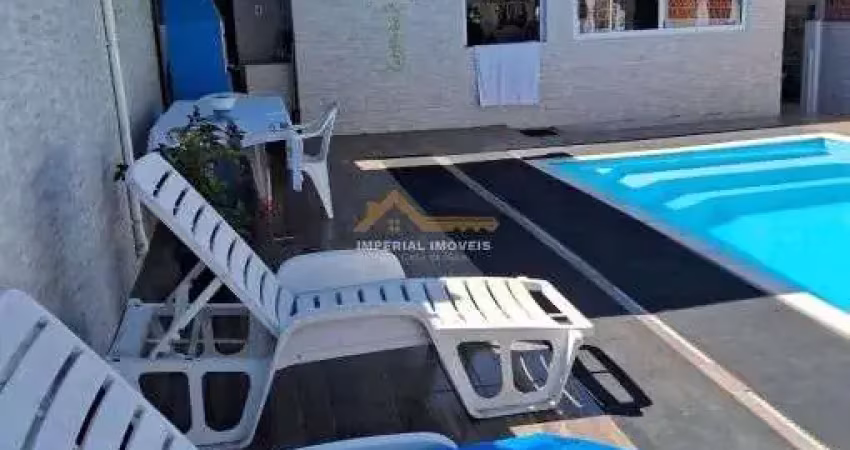 À venda i0255 - casa 3 dormitórios em massaguaçu - caraguatatuba/sp