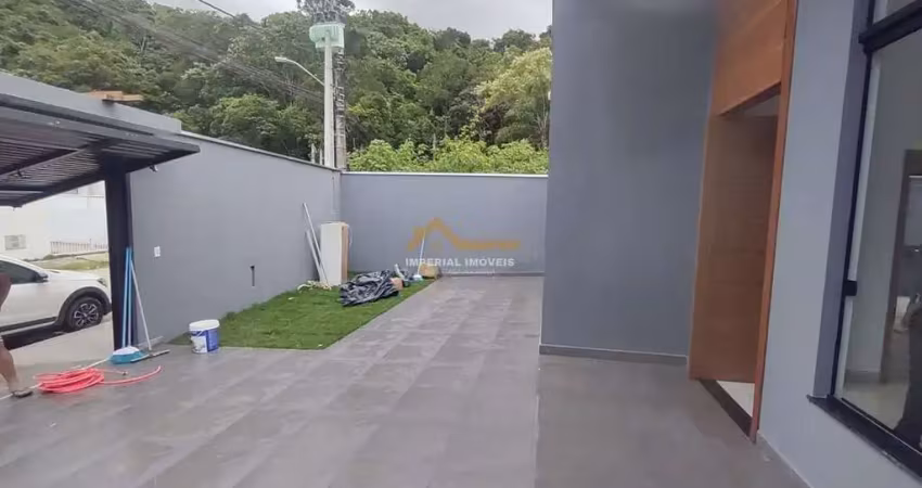 À venda i0506 - casa 3 dormitórios com piscina no massaguaçu em caraguatatuba/sp