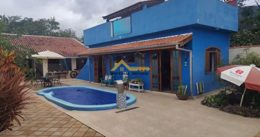 À venda i0895 - casa 3 dormitórios no massaguaçu caraguatatuba/sp