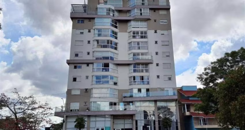 Apartamento com três quartos, um com suíte e vestir,  sala de jantar  e estar com sacada, banheiro social,  cozinha, área de serviço e dois boxes de garagem. Rebaixo em gesso, água quente, piso lamina