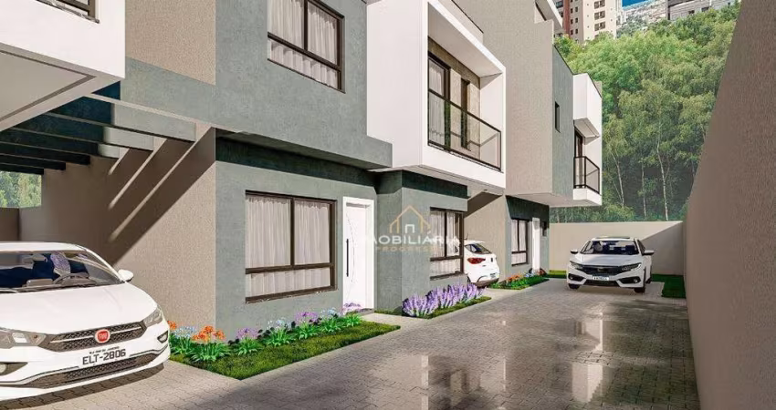 Sobrado com 3 dormitórios à venda, 122 m² por R$ 670.000,00 - Uberaba - Curitiba/PR