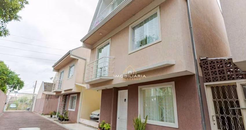 Sobrado com 3 dormitórios à venda, 156 m² por R$ 580.000 - Uberaba - Curitiba/PR