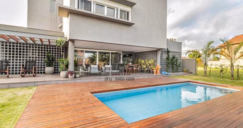 Imóvel de luxo: Casa em Condomínio com 4 suítes e 478m² em Belém Novo, Porto Alegre-RS. Agende sua visita agora!