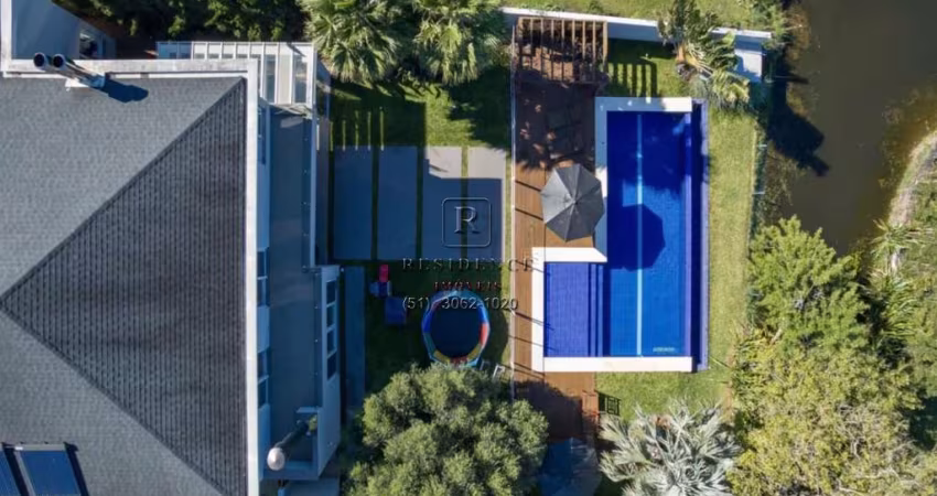 Casa de luxo no Terra Ville: 3 suítes, piscina e mais! Conheça essa oportunidade exclusiva em Belém Novo, Porto Alegre-RS!