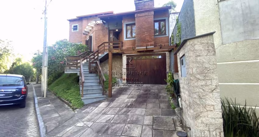 Oportunidade única: Casa rustica em condomínio fechado na Lomba do Pinheiro, Porto Alegre-RS - 4 quartos, 1 suíte, 2 salas, 3 banheiros, 1 vaga de garagem, 290m² - Apenas a 7 minutos da UFRGS!