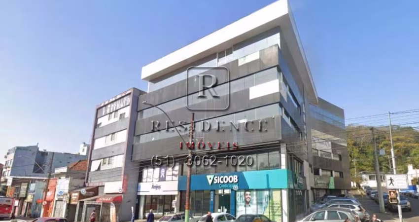 Sala comercial de 154m² em Prédio com fachada imponente, recepção e vaga para visitante. Aluguel na Azenha, Porto Alegre-RS.