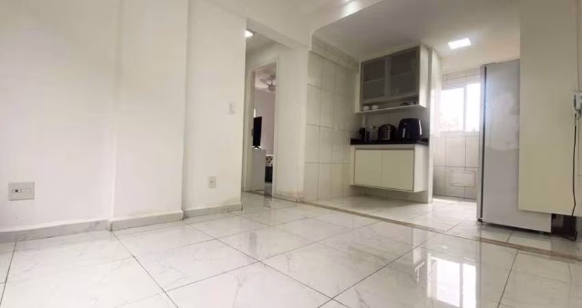 Apartamento à venda no bairro Aparecida, com 2 quartos, sendo 1 suíte.