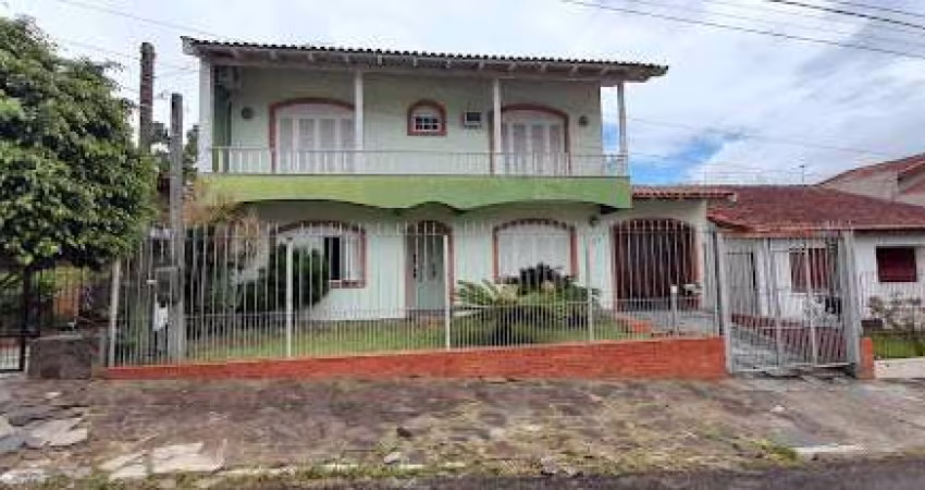 Casa com 4 dormitórios à venda, 226 m² por R$ 640.000,00 - Jansen - Gravataí/RS