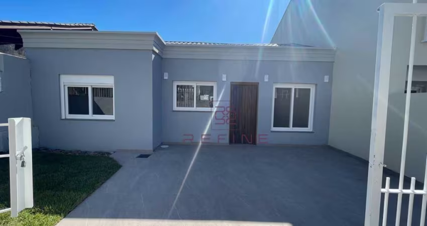 Casa com 2 dormitórios à venda, 63 m² por R$ 469.000 - Oriço - Gravataí/RS