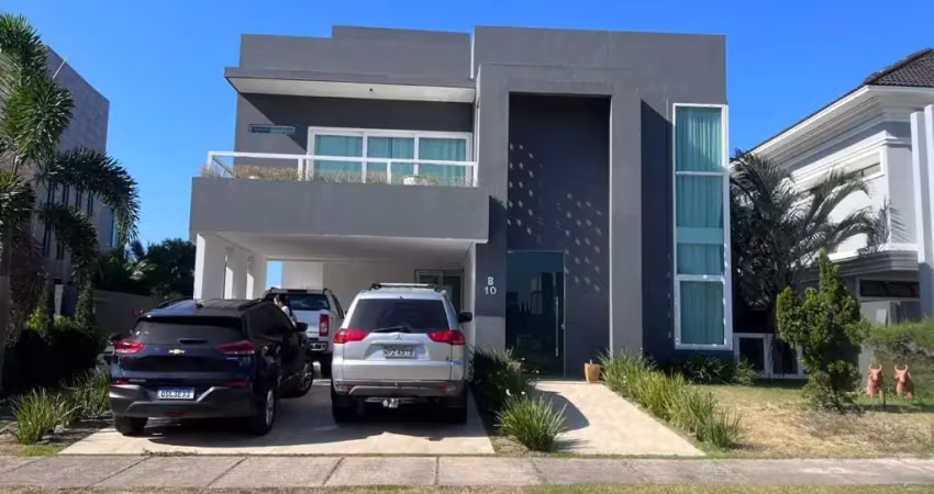 Exclusividade e luxo no condomínio villas do atlântico: casa espetacular com elevador e lazer privativo!
