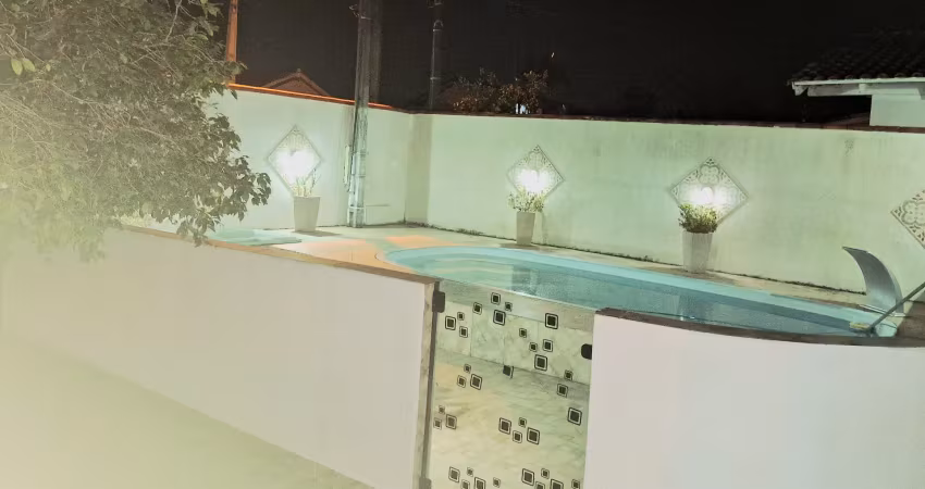 Casa em penha com piscina. permuta por casa em pomerode.