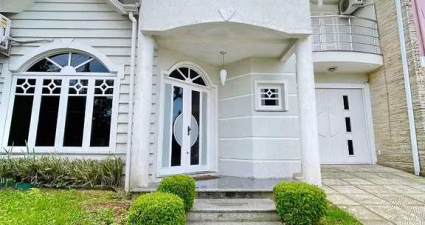 Sobrado com 3 dormitórios à venda, 249 m² por R$ 1.100.000,00 - Vale do Sol - Cachoeirinha/RS