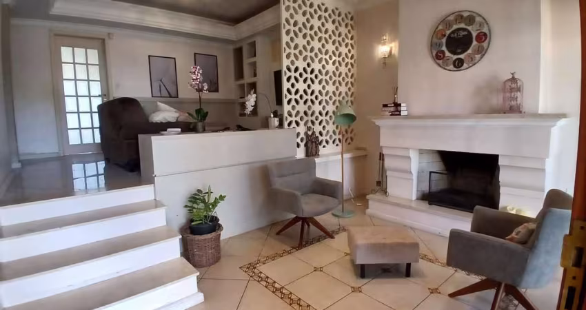 Sobrado com 4 dormitórios à venda, 259 m² por R$ 1.100.000,00 - Dom Feliciano - Gravataí/RS