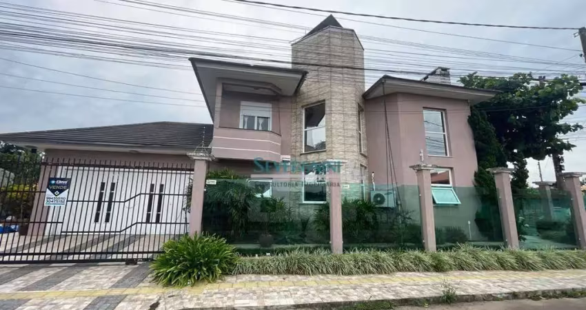 Sobrado com 4 dormitórios à venda, 229 m² por R$ 899.900 - Vera Cruz - Gravataí/RS
