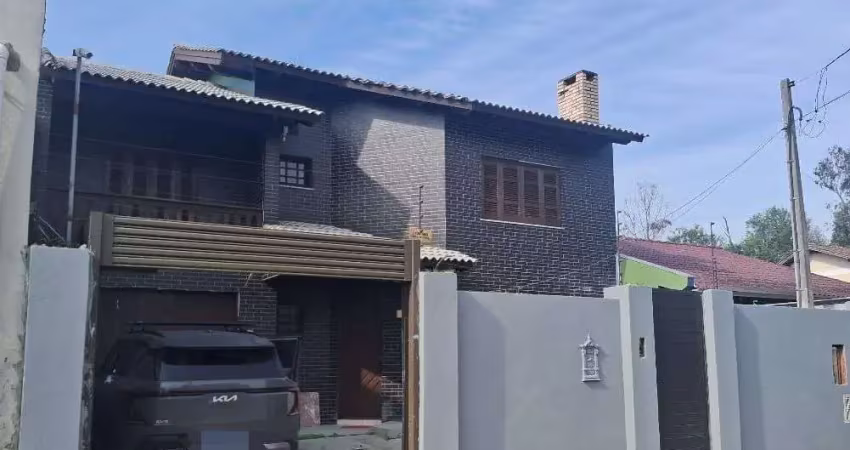 Sobrado com 3 dormitórios à venda, 290 m² por r$ 775.000,00 - jardim do bosque - cachoeirinha/rs