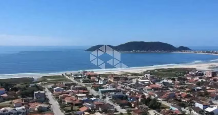 'seu lugar na praia começa aqui  terreno escriturado 12x30'