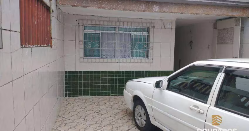 Casa geminada com 2 dormitórios , sendo 1 suíte, 2 vagas no maracanã em praia grande sp.
