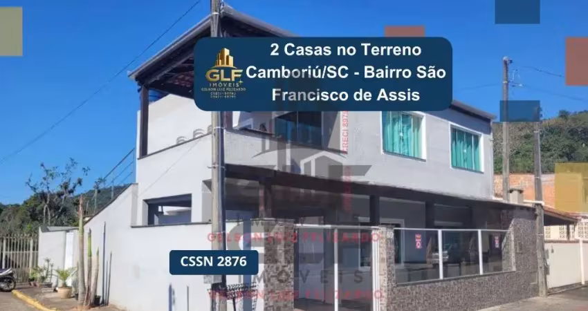 2 casas no terreno a venda em camboriú, no bairro são francisco de assis, sendo 2 casas, 1 em cada andar. terreno conta com 160 m². a 3 km