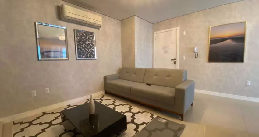 Apartamento de luxo mobiliado na cidade de itapema/sc, na meia praia, com 3 suítes e 4 vagas de garagem.