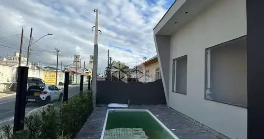 Casa sendo 3 dormitórios/ 1 quarto com suíte no bairro jardim eldorado - palhoça no valor de r$ 850.000,00 .