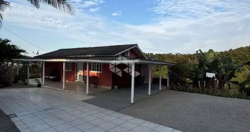 Terreno/sítio com uma casa de alvenaria a venda com 4.945 m²  no bairro são sebastião - palhoça no valor de r$ 795.000,00