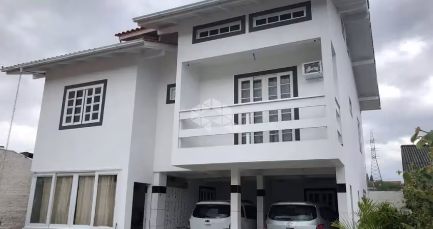 Terreno com duas casas em palhoça sc, bairro pagani à venda por r$ 1.200.000,00.