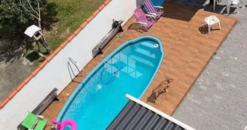 Casa a venda na praia da pinheira com  3 dormitórios sendo 1 suíte