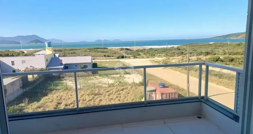 Apartamento a venda na praia da pinheira em palhoça com vista para o mar por 950.000