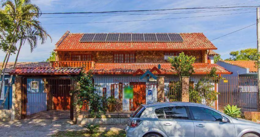 Casa com 5 dormitórios à venda, 372 m² por r$ 700.000,00 - harmonia - canoas/rs