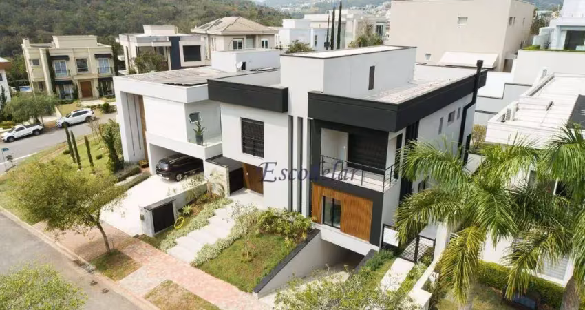 Linda casa de alto padrão no residencial gênesis 1 em alphaville - 5 suítes e lazer completo