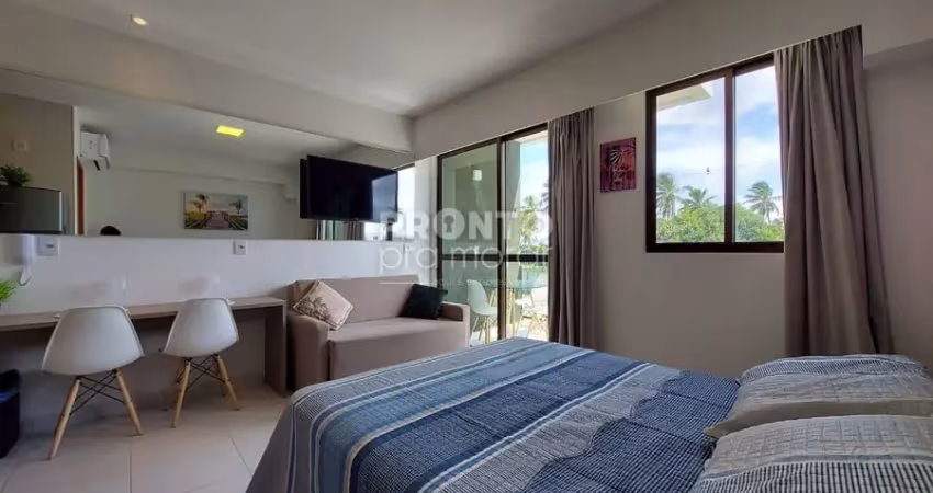 Flat mobiliado com excelente localização em muro alto, próximo ao mar.