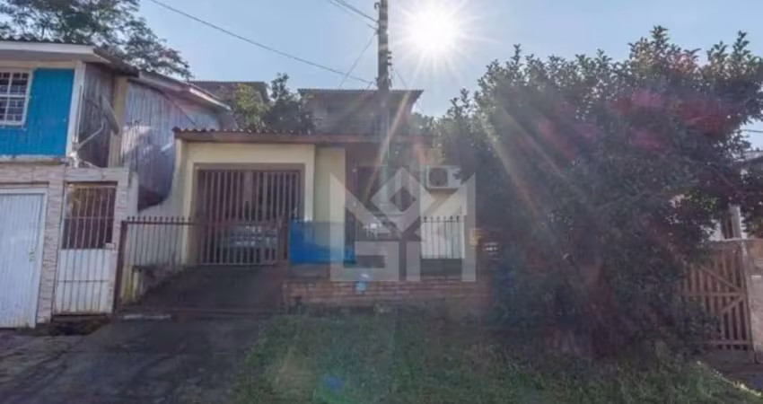 Casa à venda no bairro vera cruz em gravataí com 2 quartos e amplo terreno