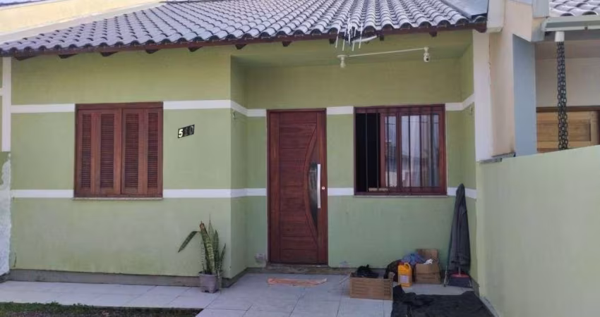 Casa Aconchegante com 2 Dormitórios e Quintal, Ideal para Sua Família!